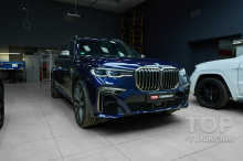 Установка карбонового тюнинг обвеса Renegade и атермальная тонировка на BMW X7
