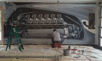 Двигатель Ferrari V12, нарисованный стене гаража