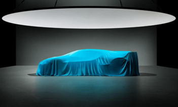 Загадочный и неясный, этот образ показывает агрессивный аэро-пакет с большим задним крылом и вертикальным стабилизатором, как на концепции Bugatti Vision Gran Turismo, которая была выпущена перед дебютом Chiron. Яркий цвет ткани также выглядит так же