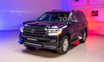 Тюнинг Тойота Лэнд Крузер 200. Замена хромированных частей на карбоновые. Оклейка молдиноов и ручек матовой пленкой.