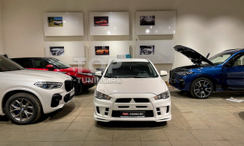 106598 Монтаж переднего тюнинг бампера Экстрим для Лансер 10