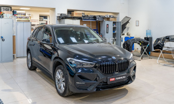107736 Монтаж сетки в бампер и покраска юбки для BMW X1