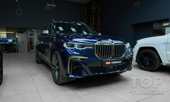 Установка карбонового тюнинг обвеса Renegade и атермальная тонировка на BMW X7