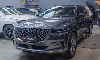 Заказать полную оклейку кузова Генезис gv80 полиуретановой пленкой в Москве 