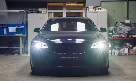 Замена линз и стекол в фарах BMW 7 серии V – оклейка + тюнинг оптики