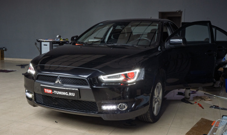 Замена передней и задней оптики, шумоизоляция дверей Mitsubishi Lancer X
