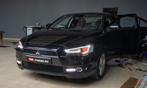 Замена передней и задней оптики, шумоизоляция дверей Mitsubishi Lancer X